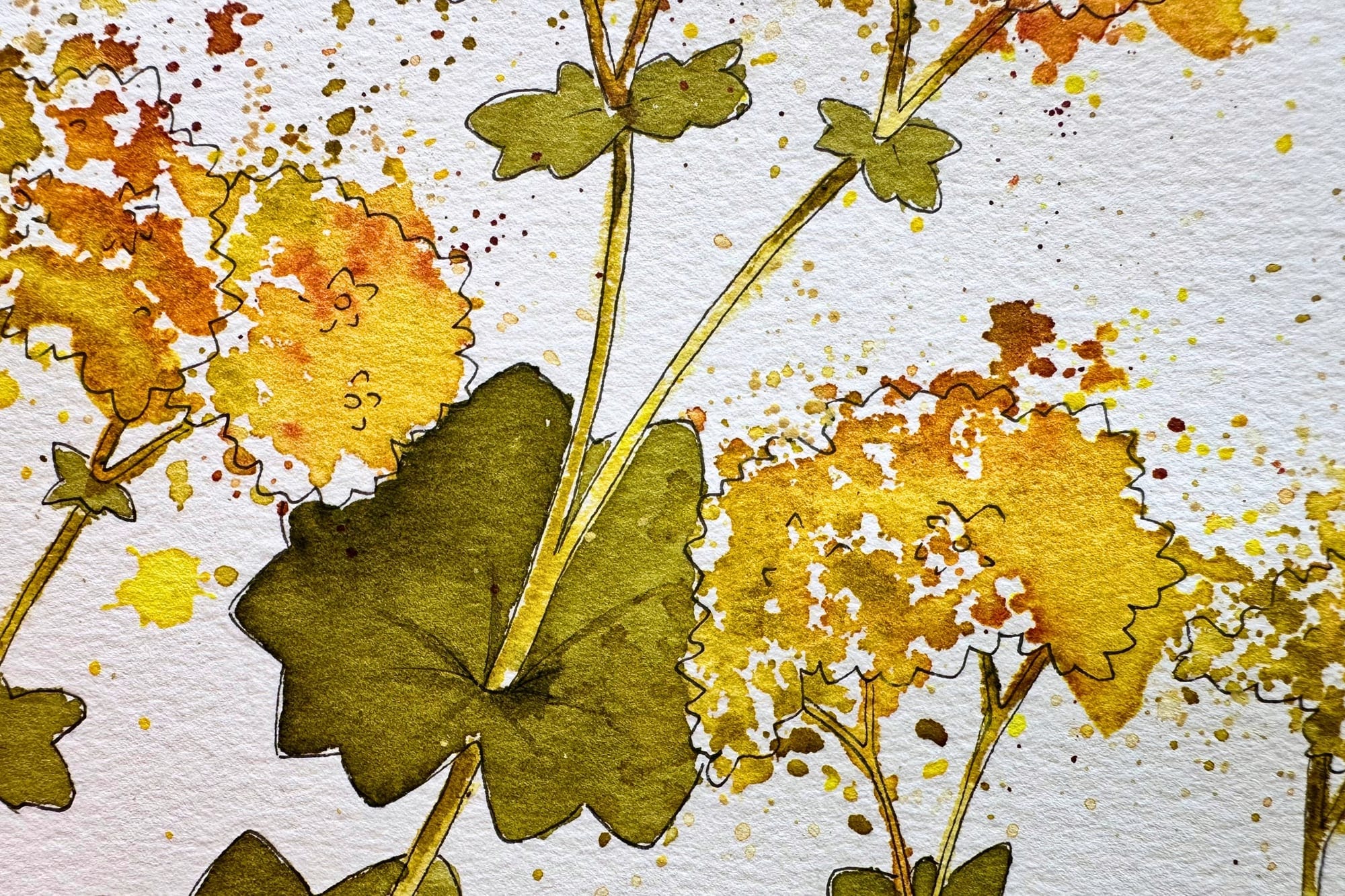 Fine paint splatters over a loosely painted floral motif